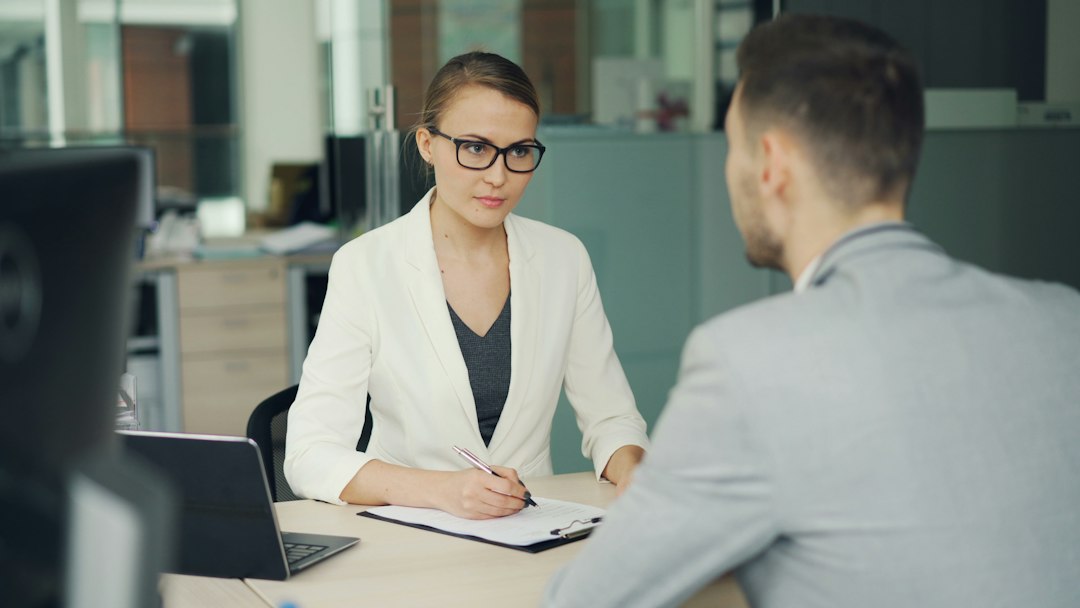 Career conversation representing practical support during unemployment and job transitions