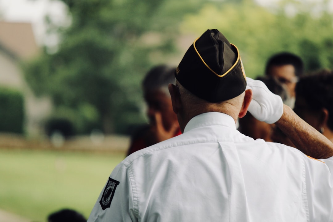 Service member saluting, representing military service and transition to civilian life