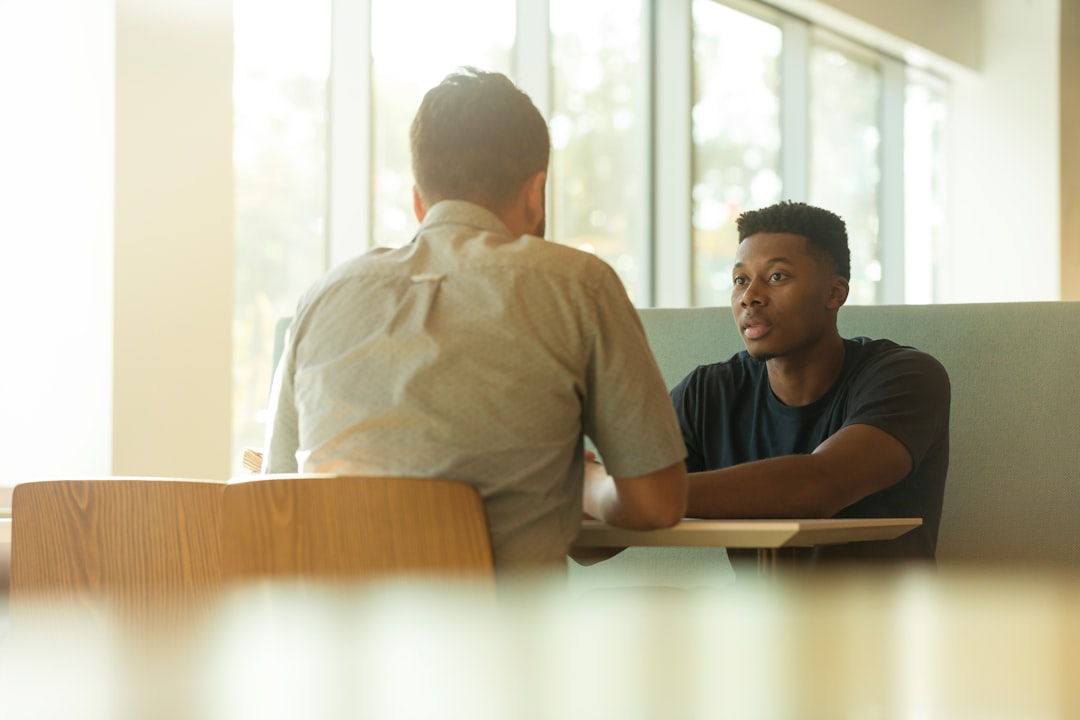 Supportive conversation representing a student reaching out to a trusted adult