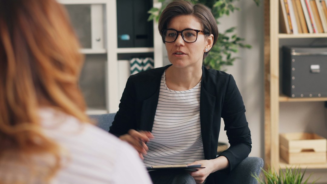 Confidential counseling conversation supporting employees in recovery