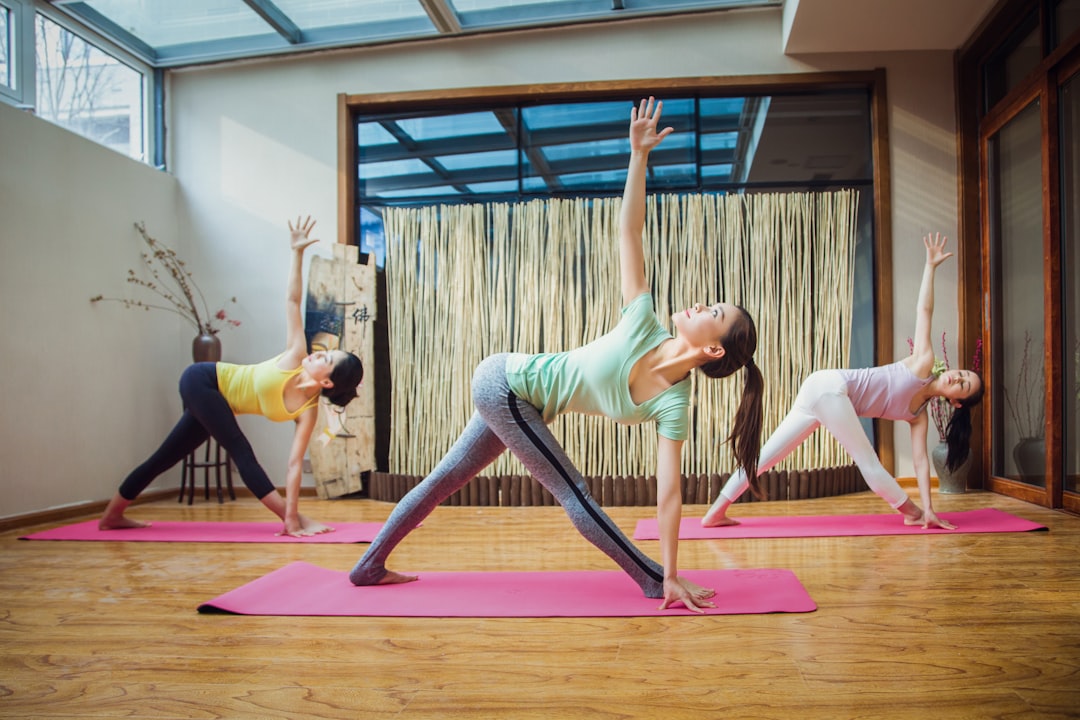 Woman practicing yoga indoors to release tension and support relaxation